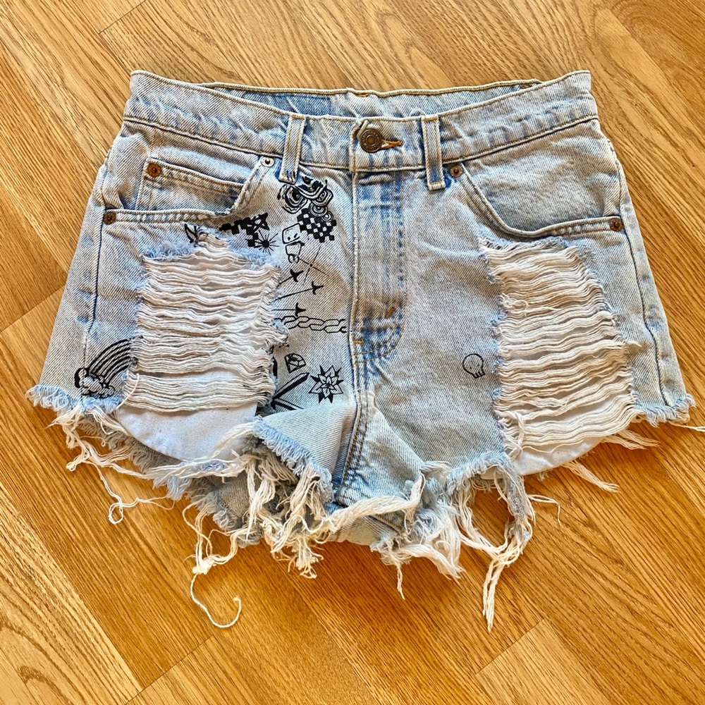 Levi’s Mid Rise Distressed Denim Shorts